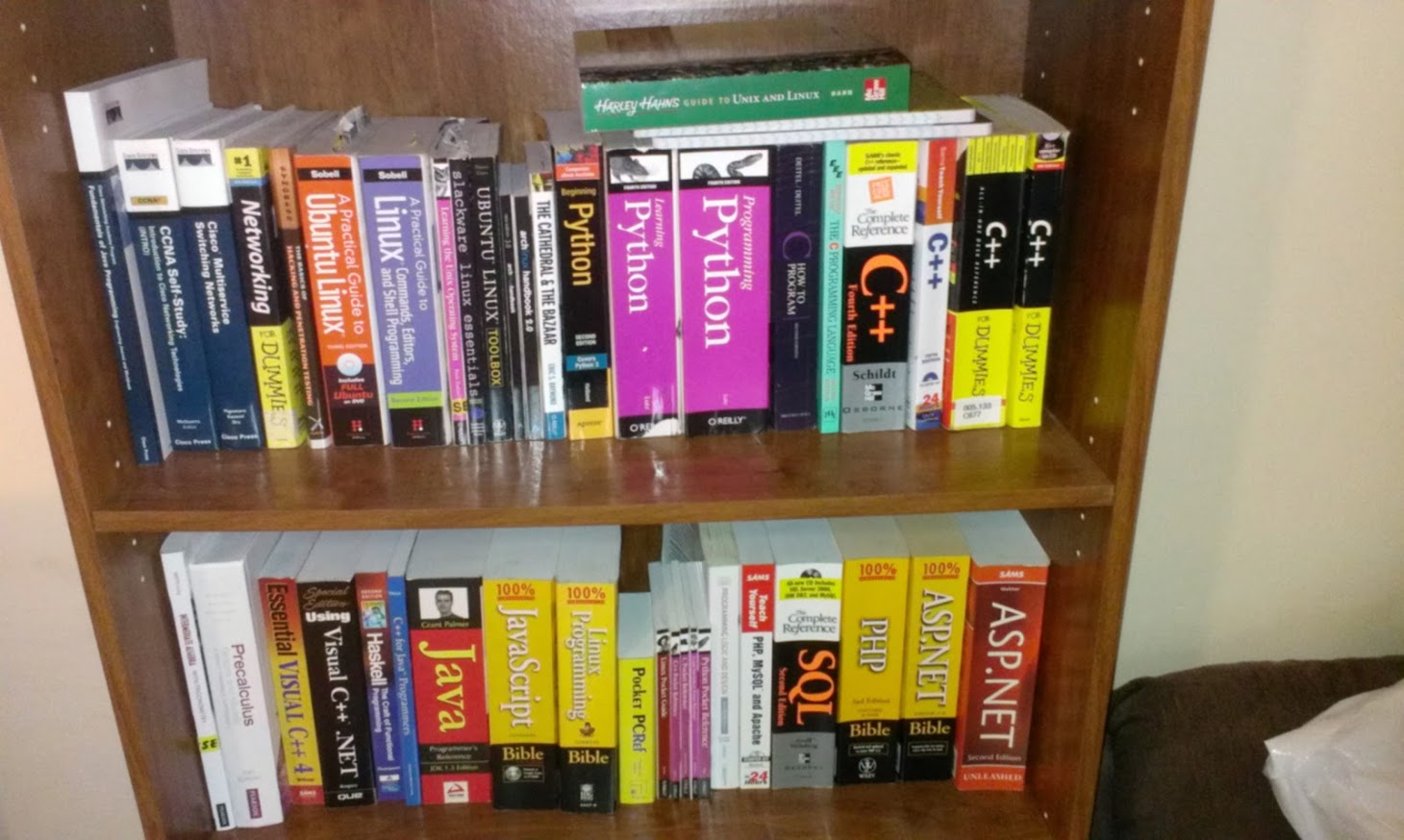 My geeky section of my bookshelf.